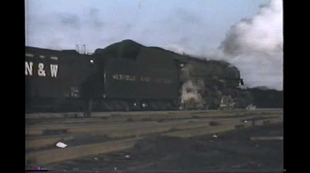 Steam locomotive pointed away from camera