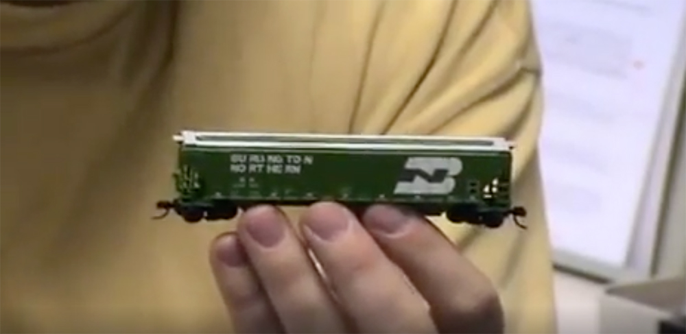 Cody Grivno holding a boxcar