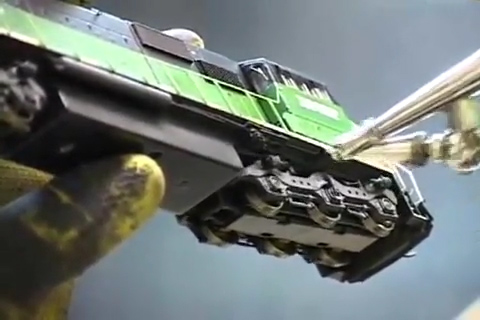 Airbrushing details on a model diesel locomotive