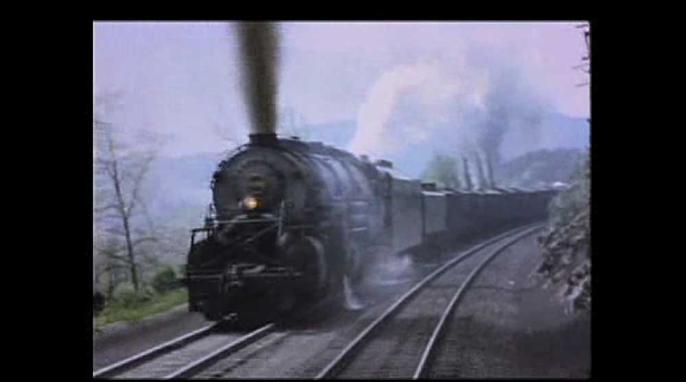 Smoking steam locomotive approaching