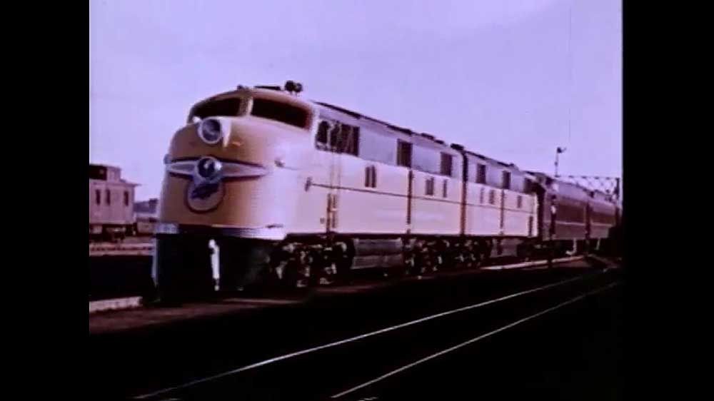 Streamlined yellow diesel locomotive