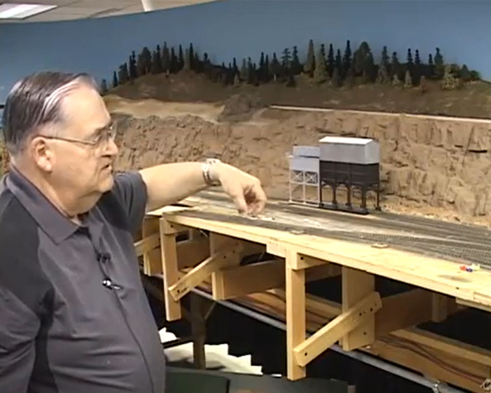 Jim Hediger next to layout