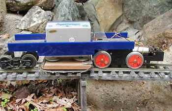 Build a track-cleaning vehicle