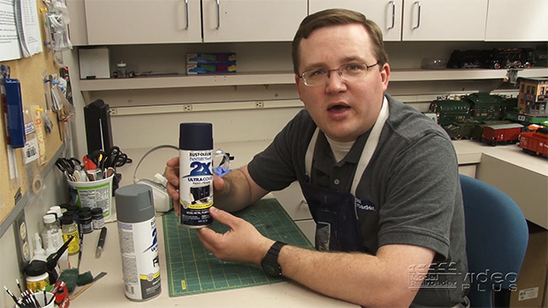 Cody Grivno holding can of spray paint