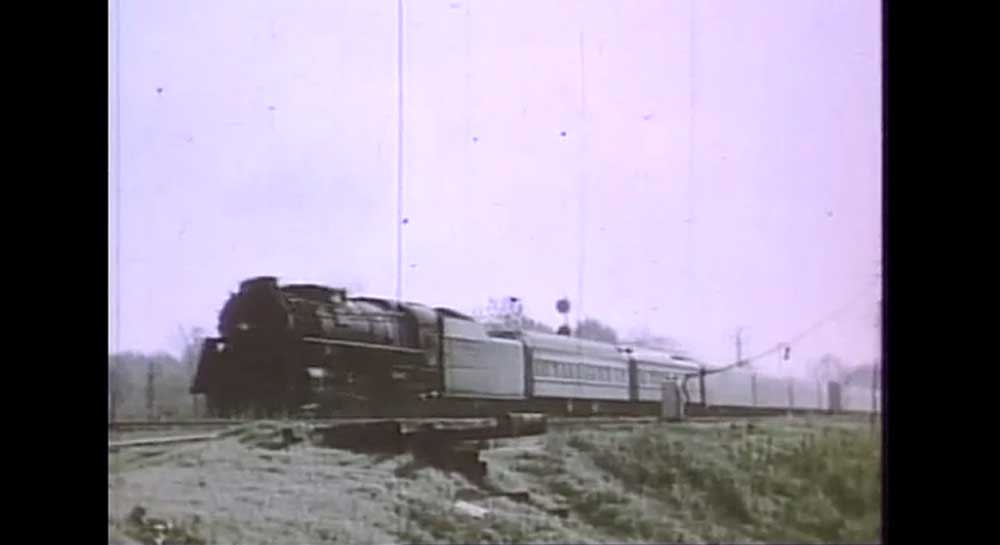 Steam locomotive with passenger train