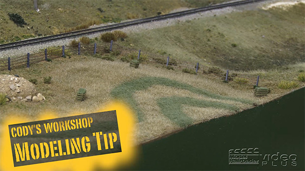 farm field scene on a model railroad