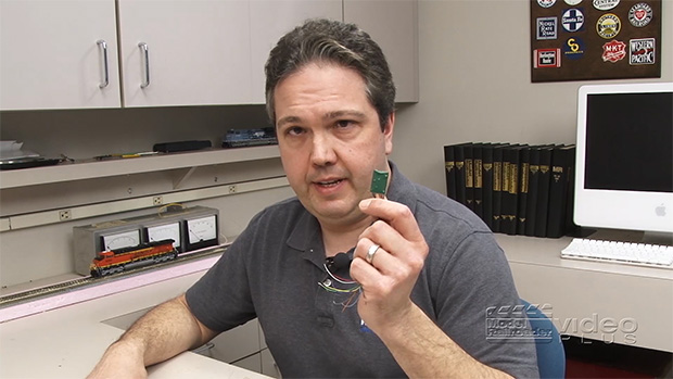 Dana Kawala installing a DCC decoder.