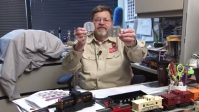 Bob Keller sitting at his desk