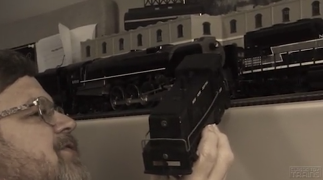 Bob Keller holding an O gauge locomotive