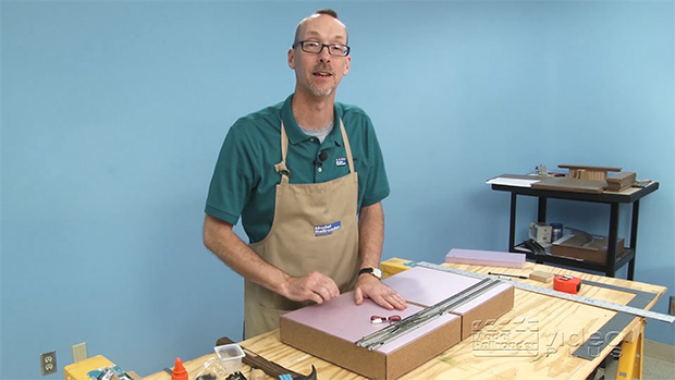 David Popp working with foam insulation boards.