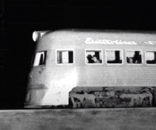 Side image of a streamlined electric interurban car.