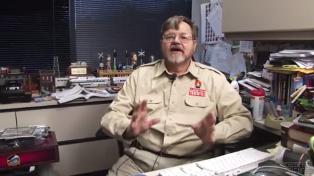 Bob Keller sitting at his desk