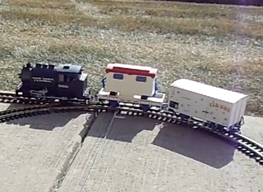 Train pulling two cars