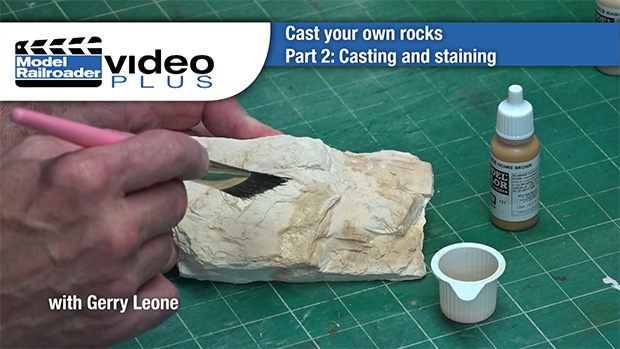 Gerry Leone staining plaster rocks.