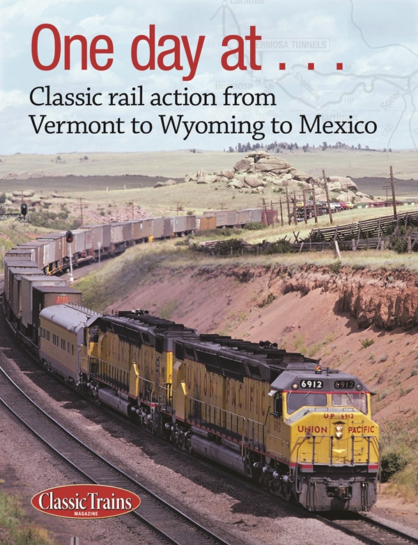 The cover shows a photo of a diesel freight train