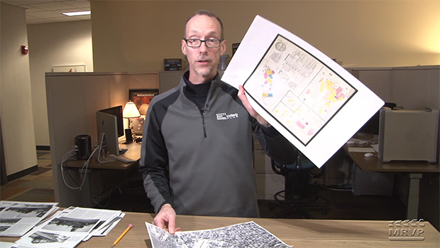 David Popp looking at maps.