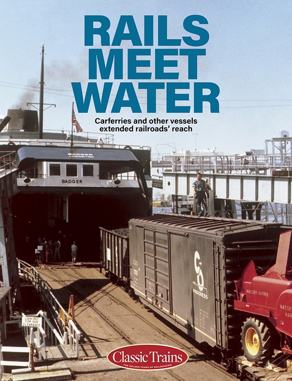 The cover shows a vintage color photo of box cars on a ferry