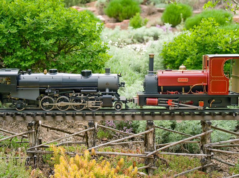 Two engines facing each other on a garden layout