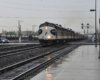 A business train pulling into a station