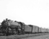 Steam-powered passenger train with boxcar