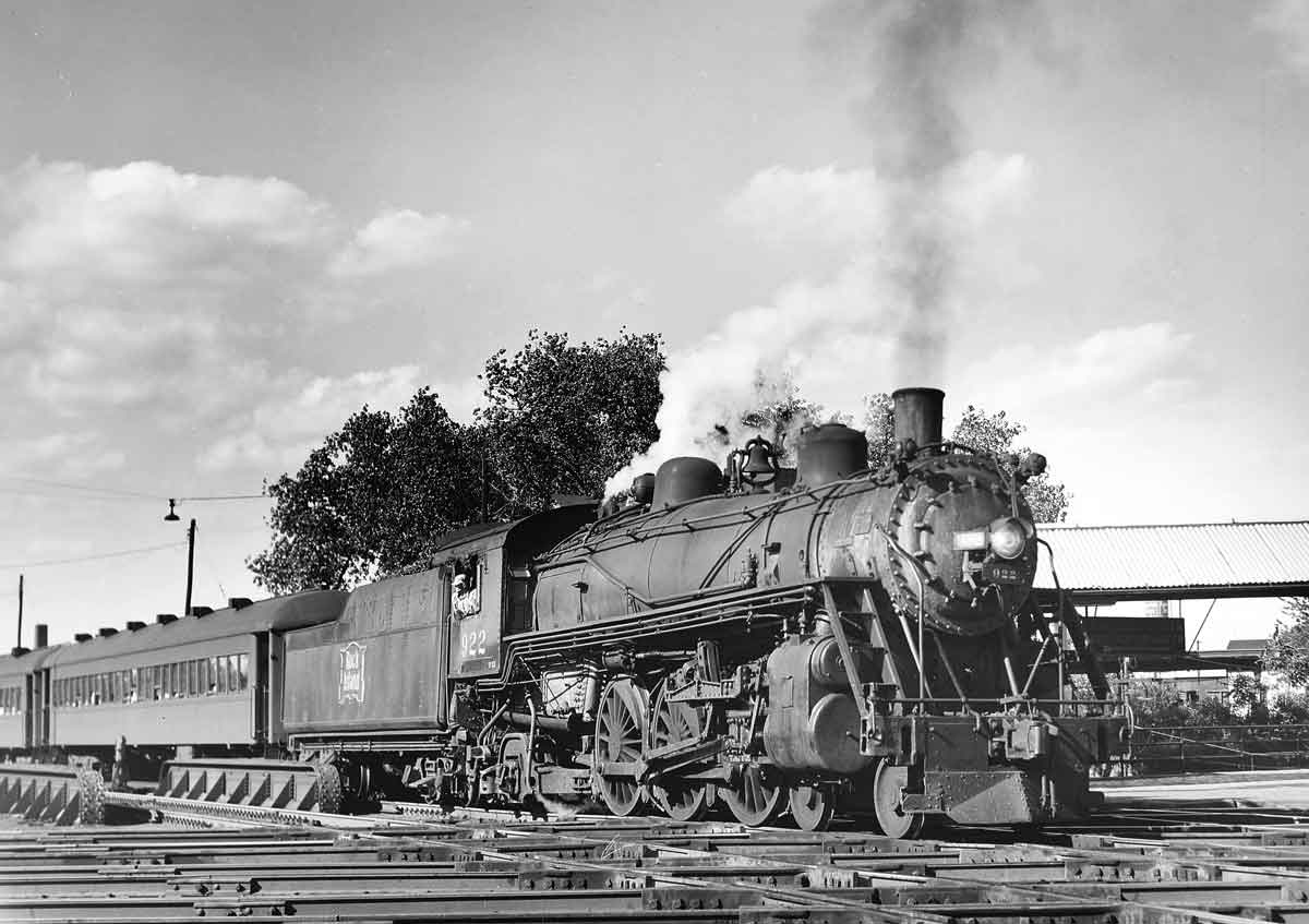 Steam locomotive with passenger train