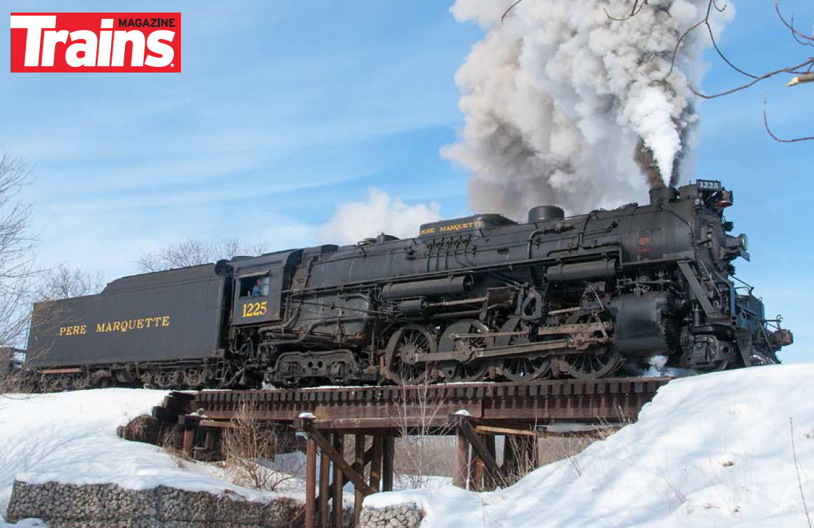 Pere Marquette 2-8-4 Berkshire type steam locomotive No. 1225 steams near Owosso, Michigan.