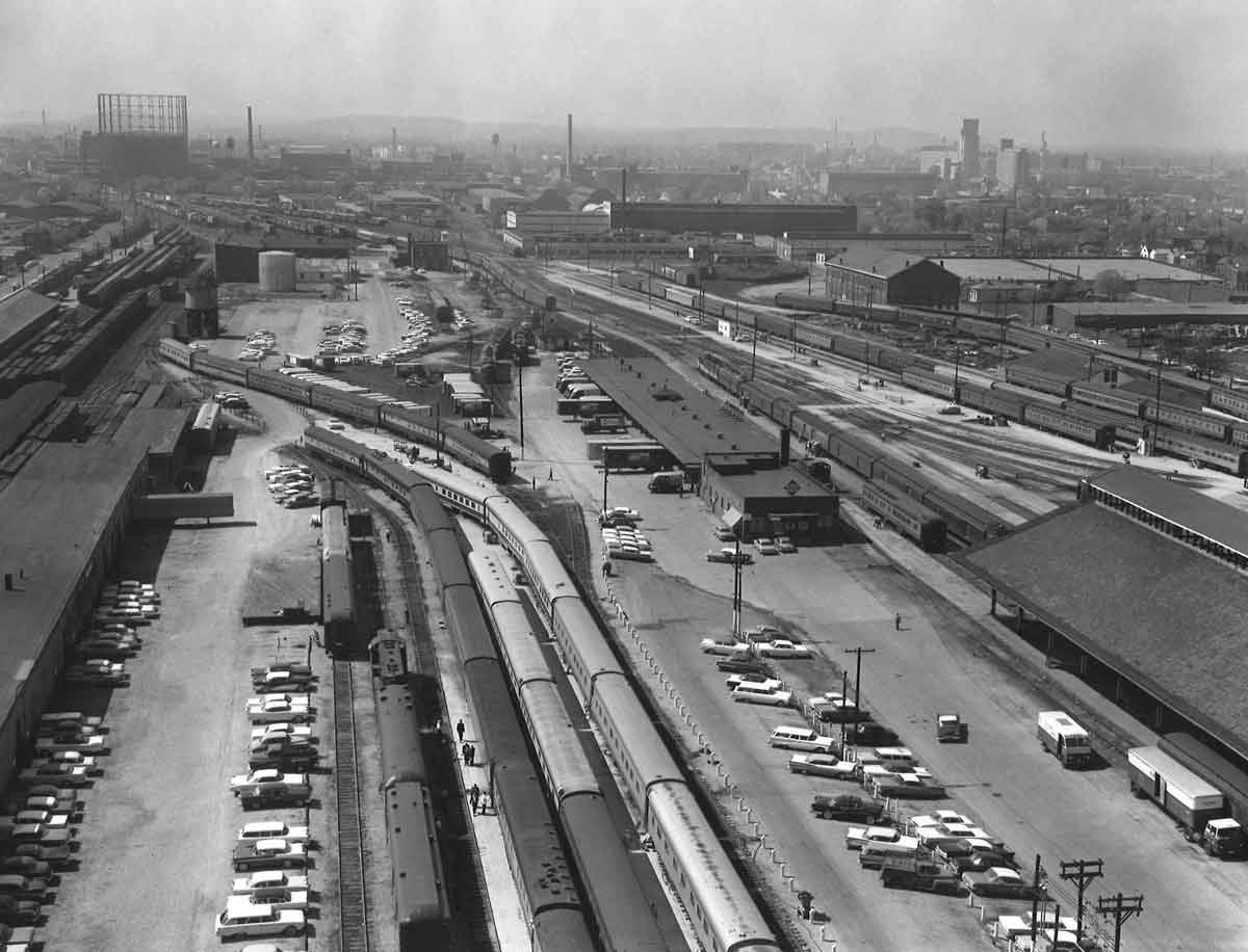 Passenger station full of trains seen from overhead