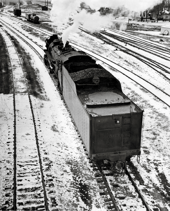 An overhead, above, shot of a train leaving the station
