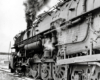 A close up shot of the wheels on a train