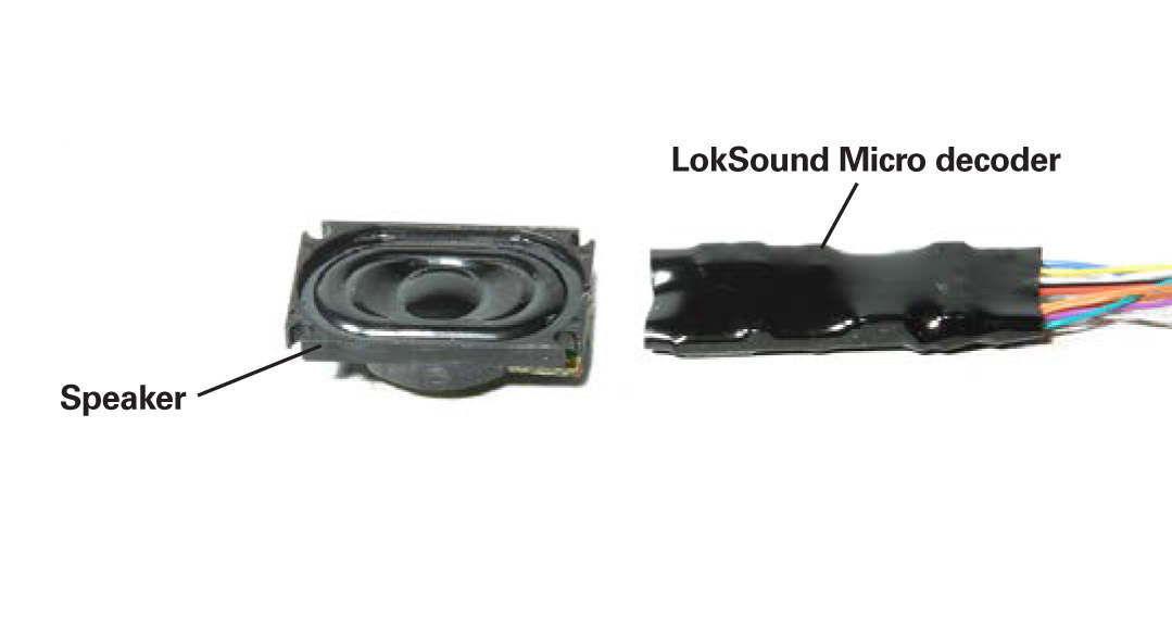 How to add DCC sound to a compact HO switcher: An image of a sound decoder and speaker
