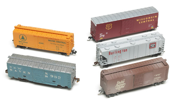 Better track, wheels, and couplers: An image of five model freight cars