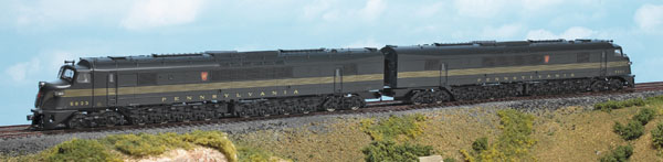 Models of two long streamlined diesel locomotives