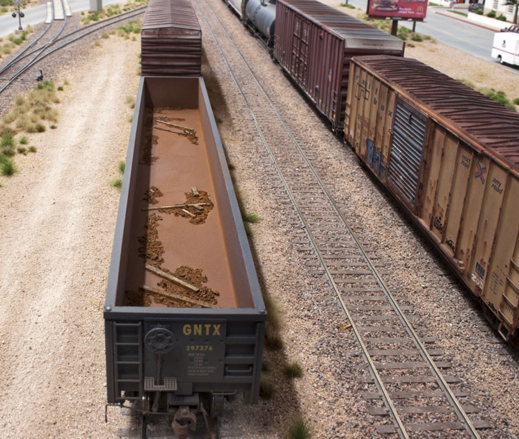 The finished weathered gondola model looks like the real thing on Pelle Soeborg's HO scale model railroad.