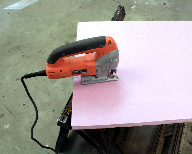 An image of a jig saw on a piece of pink foam board.