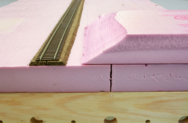 An image of foam board after being shaped by a sander.