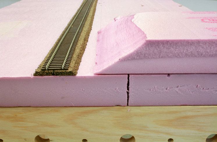 An image of foam board after being shaped by a sander.