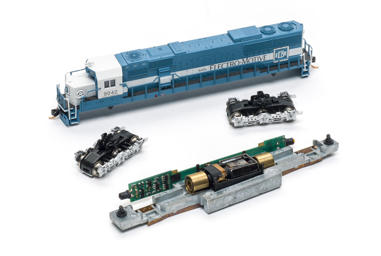 N scale engine performance improvements: an image of a model locomotive, partially deconstructed