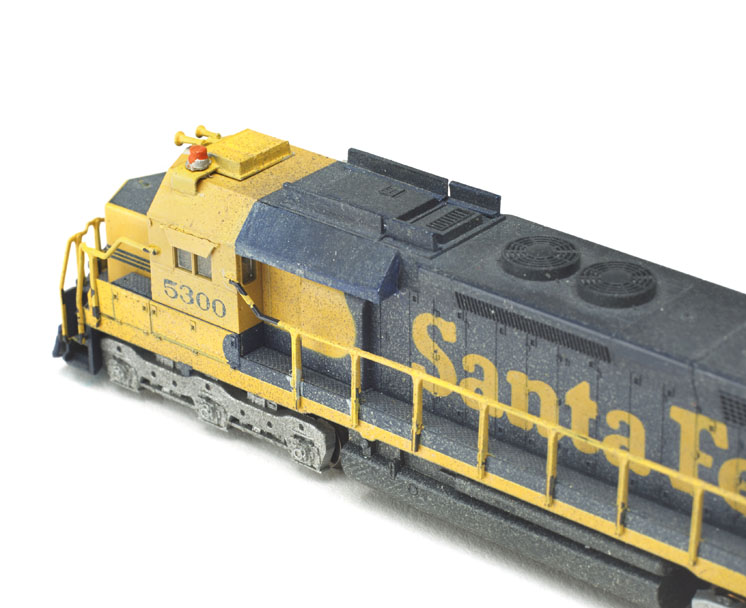 Thoughts on detailing N scale diesels: An image of a model railroad locomotive