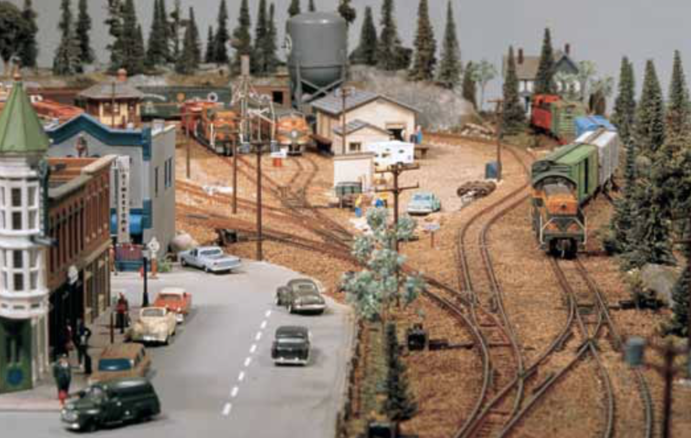 A lengthwise view of Dan Culp's layout with a look down a ladder track into the yard.