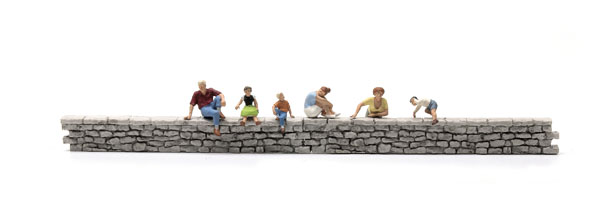 Preiser GmbH HO scale pedestrians sitting on a wall