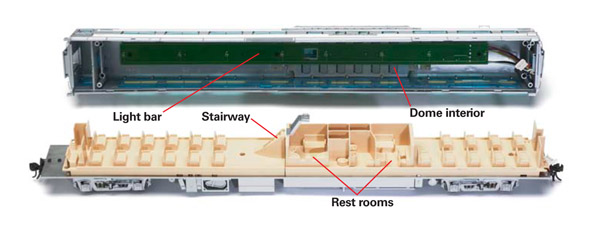 ThemoldedplasticinteriorincludesthemainfloorseatsdomeaccessstairwayandtherestroomsbeneaththedomeThedomeseatsareabovethelightbar
