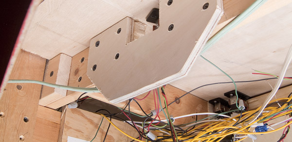 This gusset plate connects a wood stringer and provides space for a switch machine. It could have been avoided with better planning