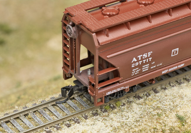 Tips for body mounting couplers: An image of a model boxcar, featuring the coupler in the center of the frame