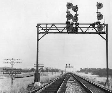 Absolute signal on a steel framework spanning a double-track mainline