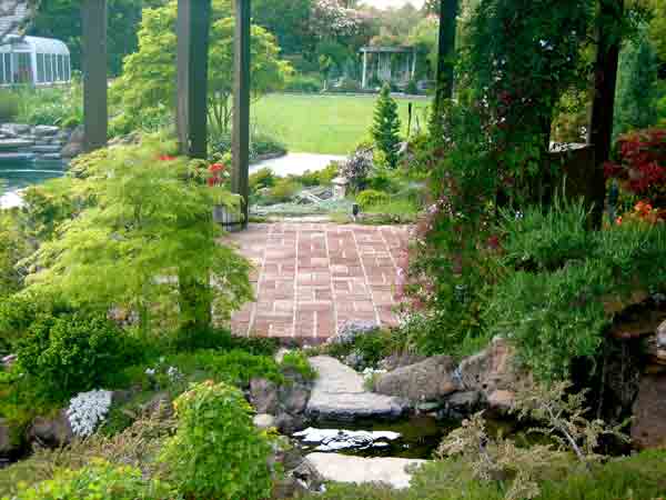 water feature with stone walkway behind it