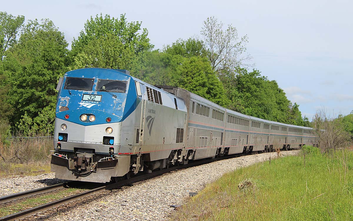 Passenger train with one locomotive and bilevel cars