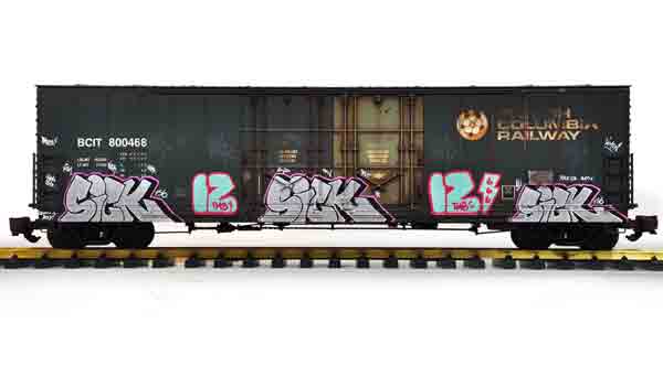 black boxcar with grafiit