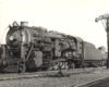 A close up black and white photo of the Boston & Maine Railroad 2-10-2 Santa Fe-type locomotive No. 3021 sitting on the tracks