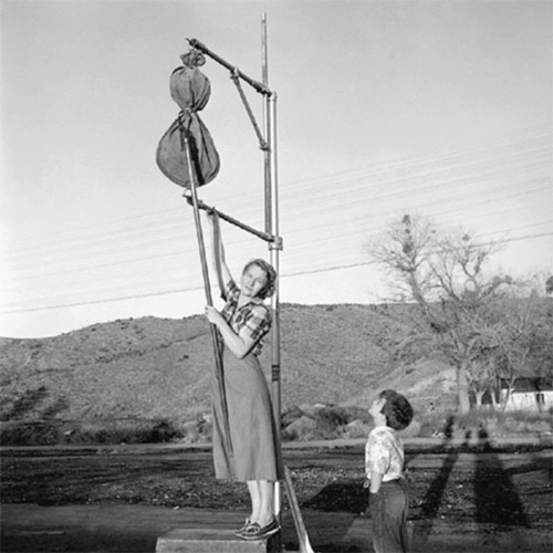 Leah Rosenfeld hangs mail