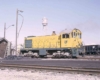 Yellow diesel switcher in yard